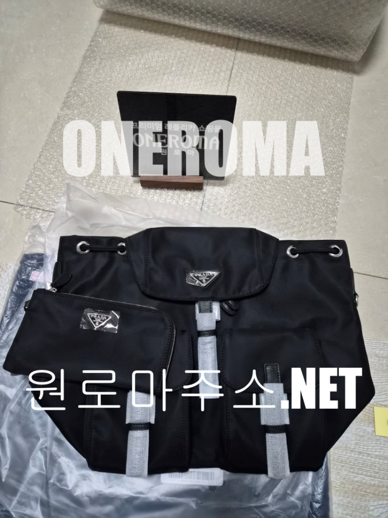 윤*성 고객님 프라다 리나일론 백팩